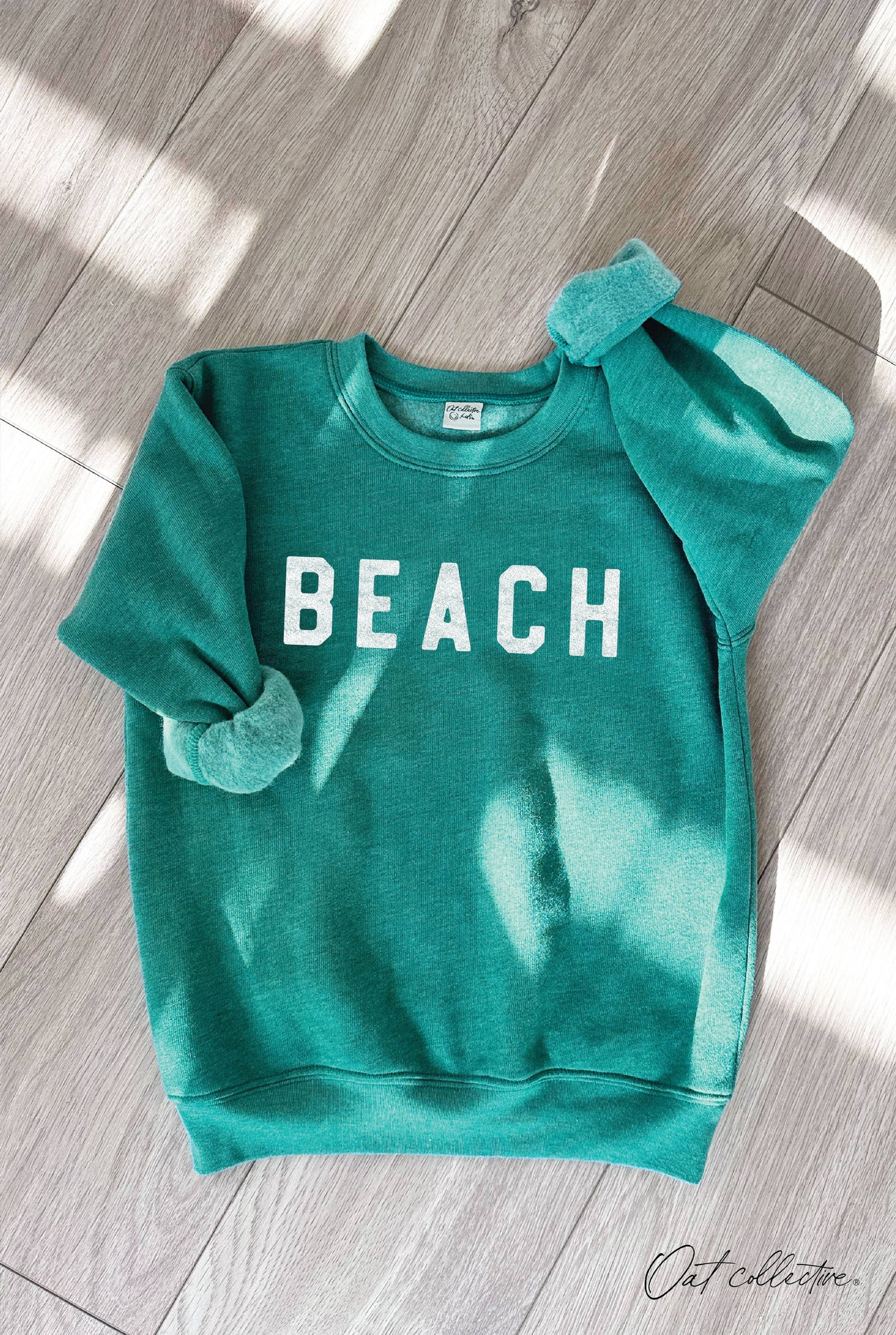 BEACH UNISEX SWEATSHIRT || CRANBERRY HEATHER